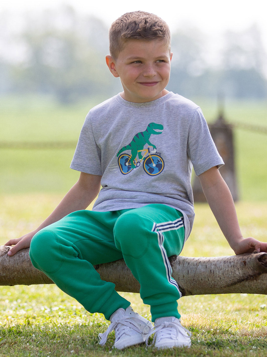 Kinder T-Shirt Dino auf Fahrrad